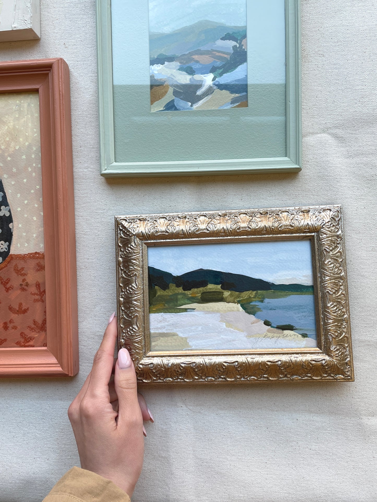 An art piece showcasing the harmony and natural beauty of a mountain and water landscape.