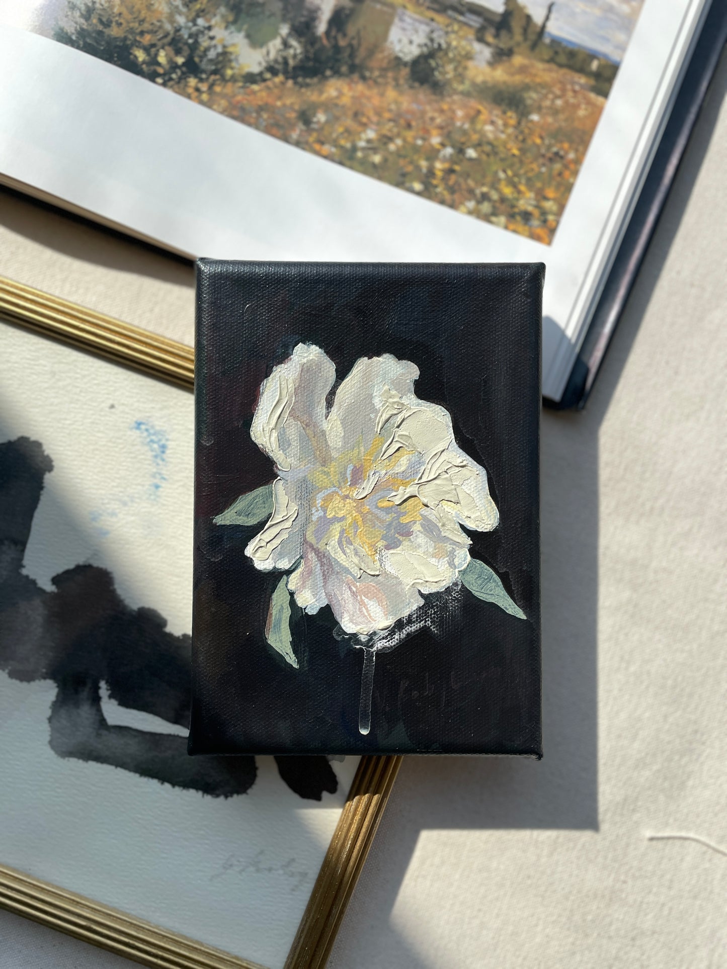 beige wall art black painting