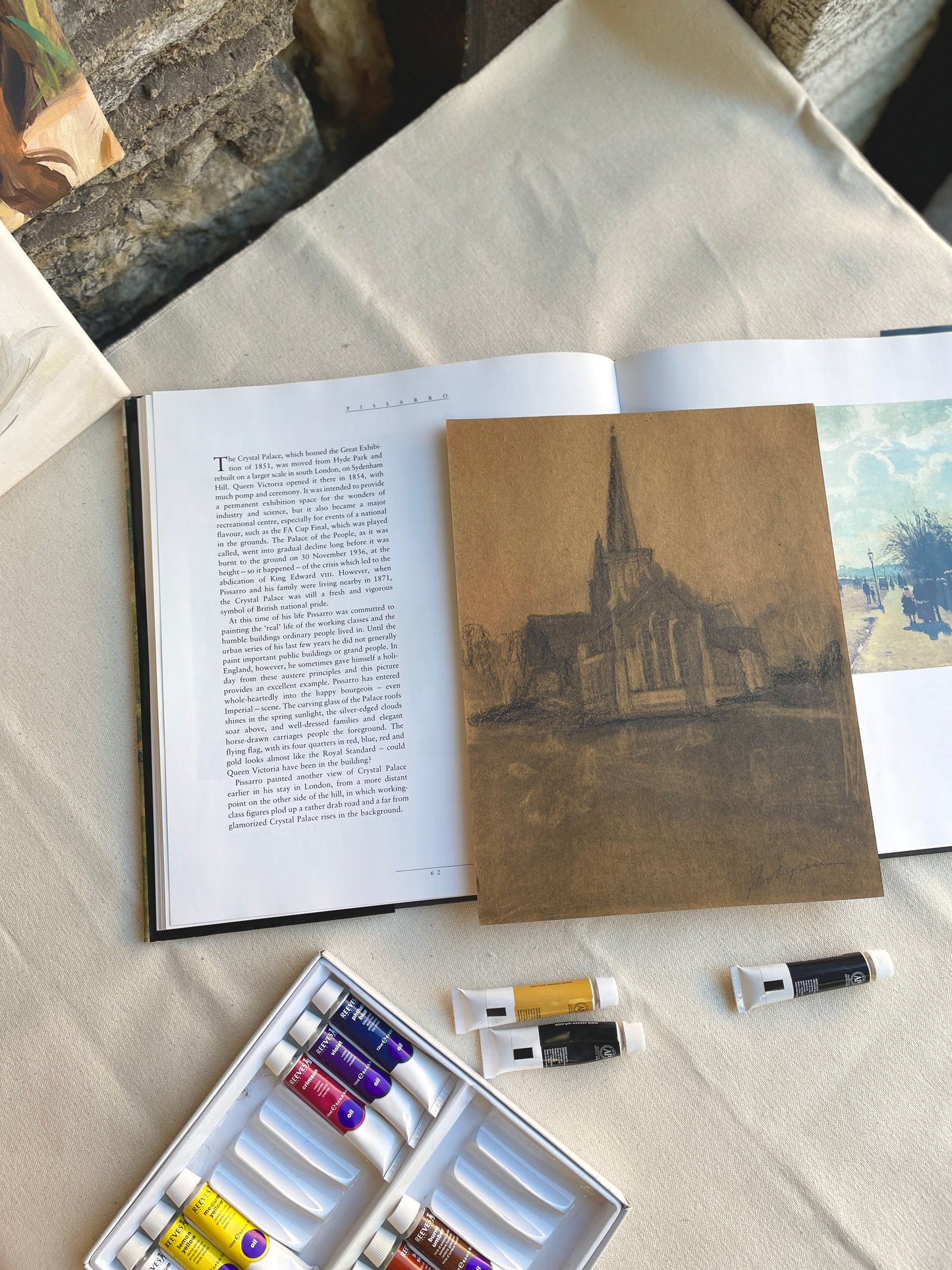 Artistic depiction of historic church with tall spire