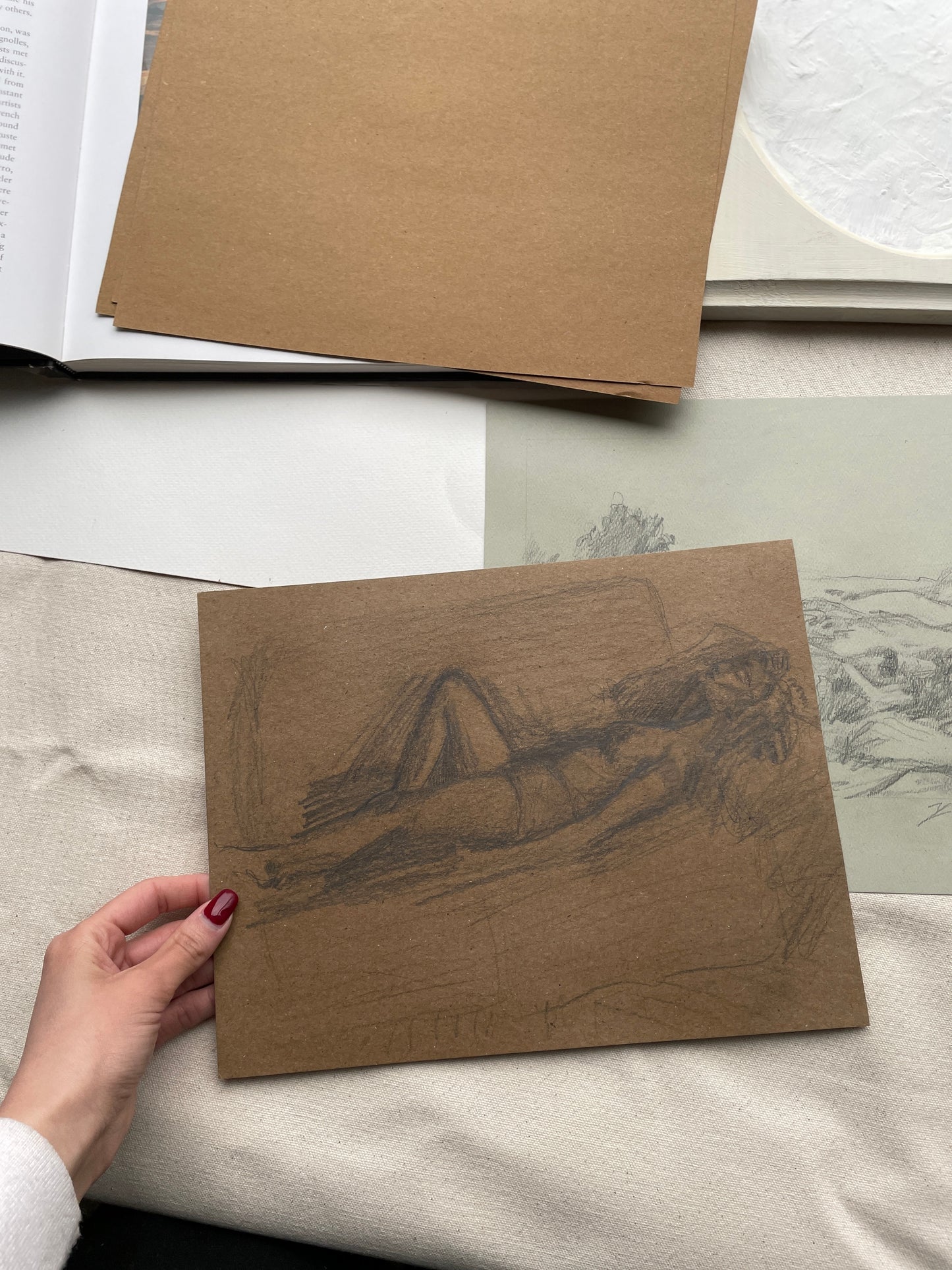 Sketch of female figure in relaxed pose