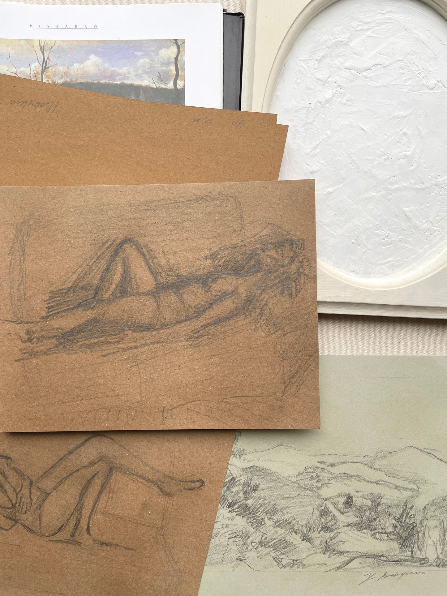 Monochromatic wall art of woman on couch