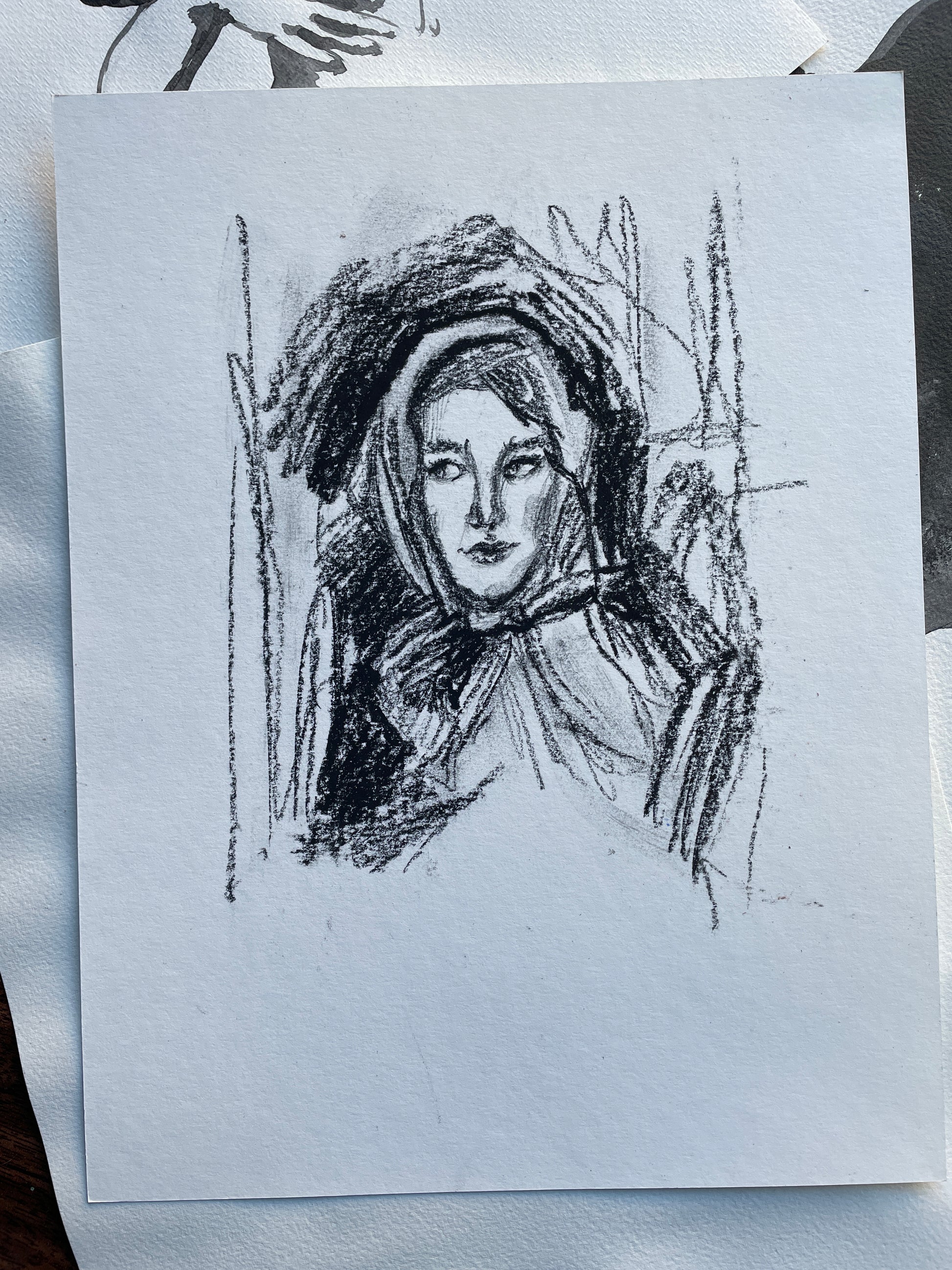 Sketch-like portrait of a young woman in black and white