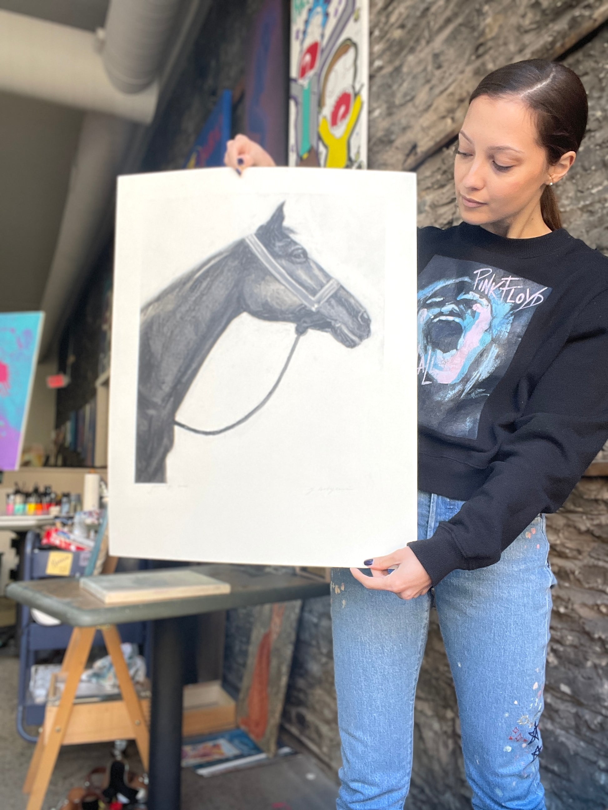 Charcoal drawing of a horse on paper