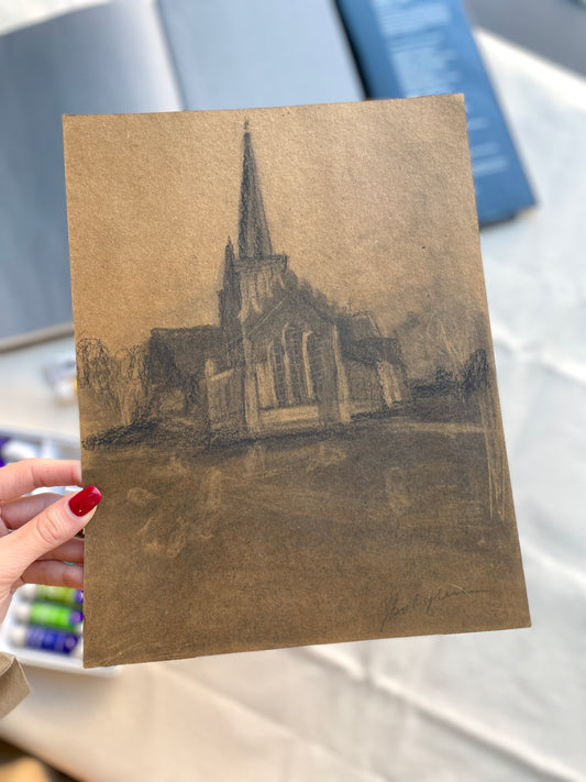 Charcoal drawing of English church on craft paper