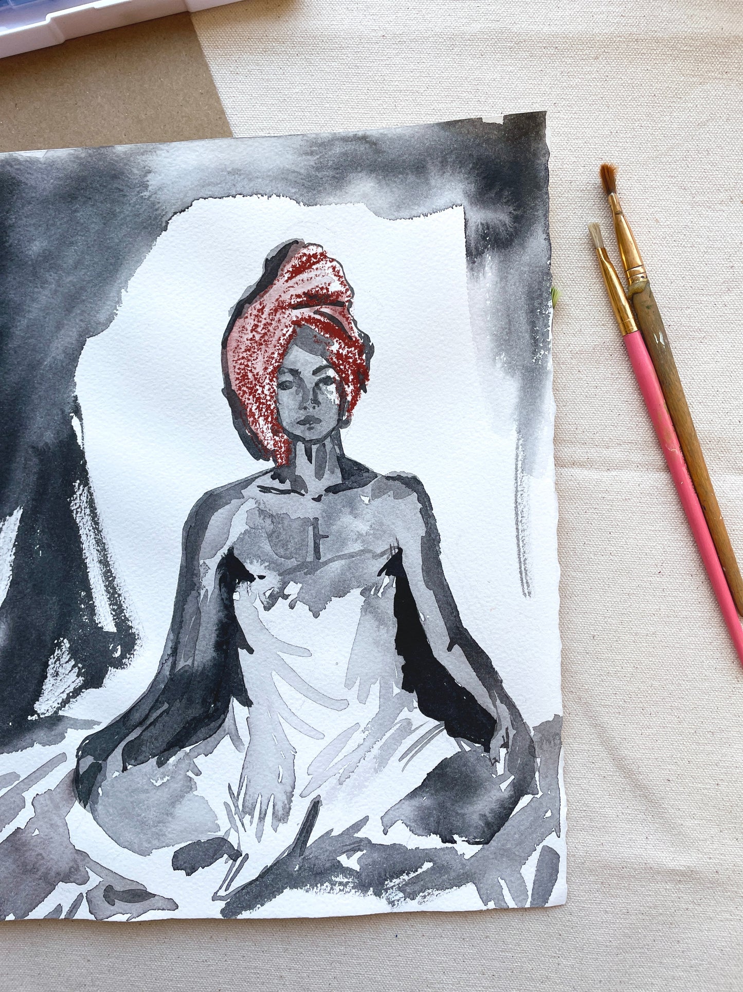 Mixed media artwork of woman wrapped in towel on white watercolor paper