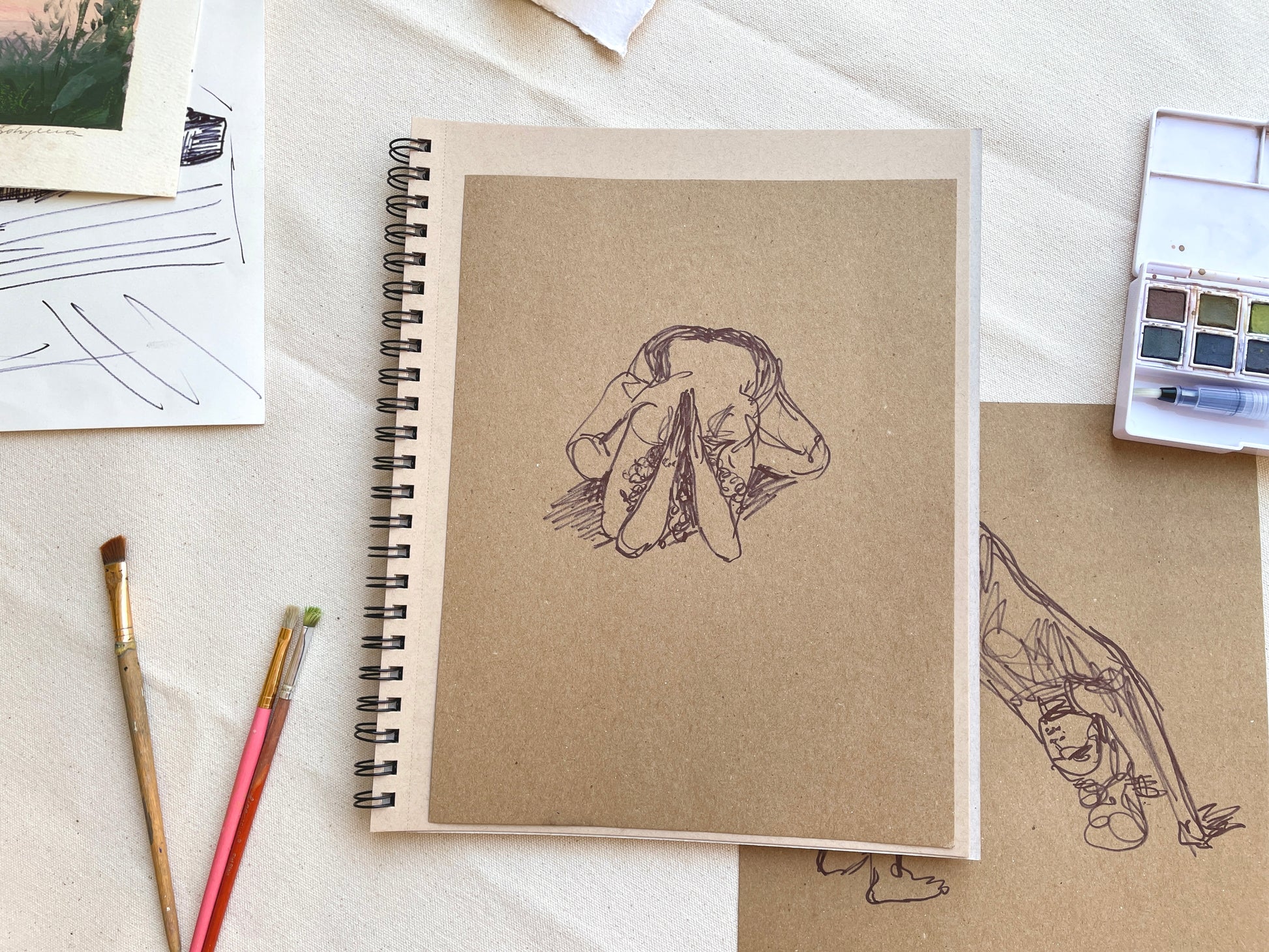 Hand-drawn yoga art: woman practicing asanas on craft paper