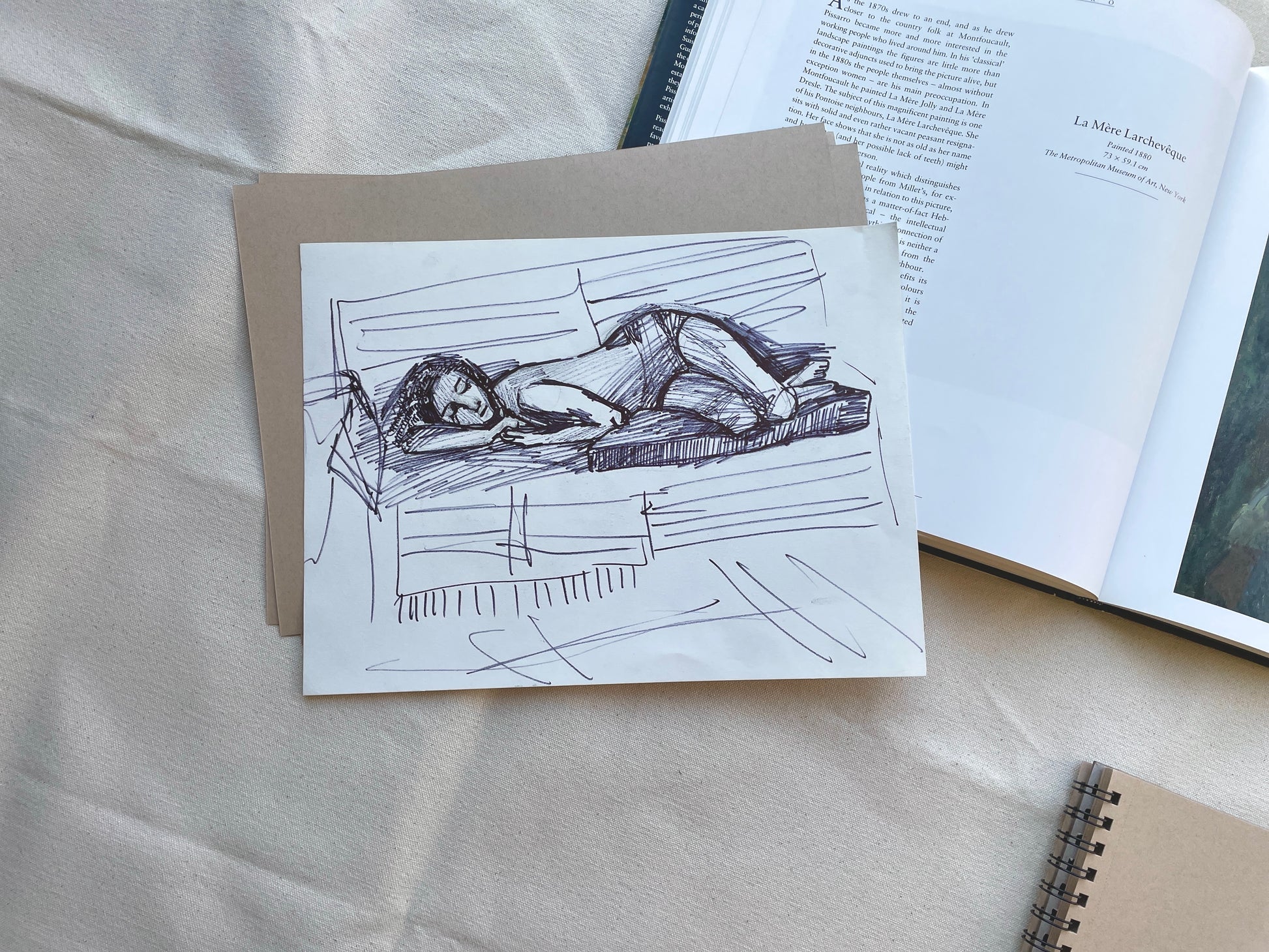 Bold marker drawing of a reclining woman.
